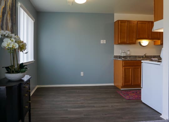 Open Dining Room with hardwood floors and easy access to Kitchen, at Gale Gardens Apartments