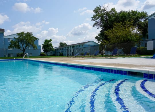Swimming Pool entry with Pool chairs, at Gale Gardens Apartments