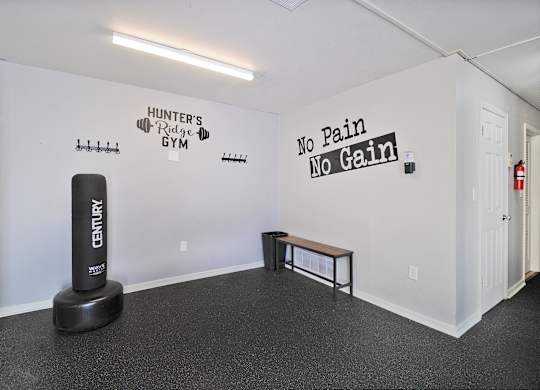 Apartments near WMU with a fitness center. Punching bag. Hunters Ridge Apartments in Kalamazoo, MI has a fitness center