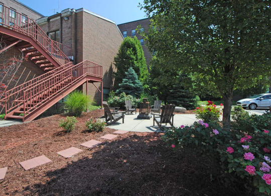 Outdoor seating and fire pit at Bancroft Luxury Apartments. Apartments in Saginaw