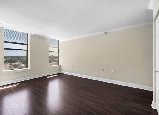 Spacious living room with natural light. Hardwood floors and luxury feel. One Bedroom Apartments in Saginaw, MI