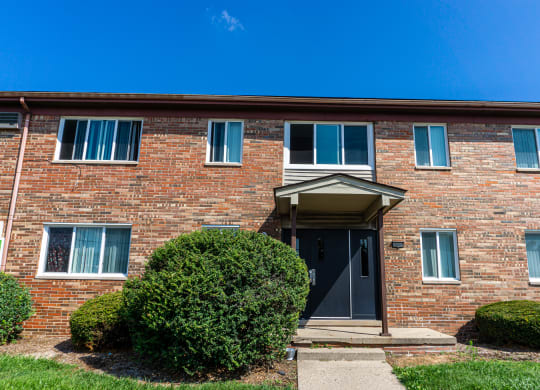 Apartment building entrance at Golf Manor Apartments in Roseville, Michigan