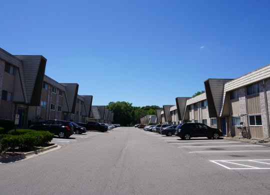 Apartment buildings and parking at Woodcrest Apartments in Westland, Michigan