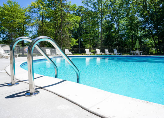 Sparkling Swimming Pool at Woodcrest Apartments in Westland, Michigan