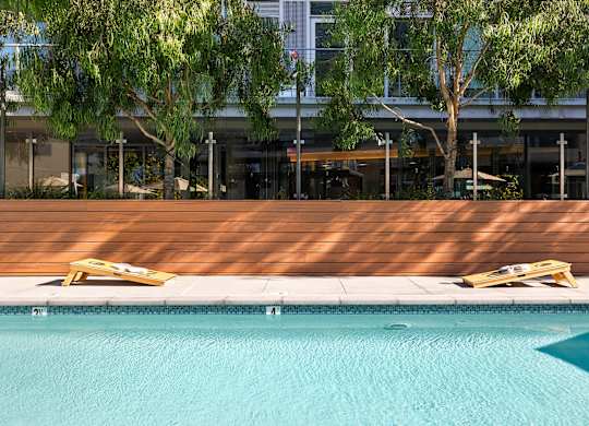 Pool with a wooden deck at K1 Apartments, San Diego, 92101