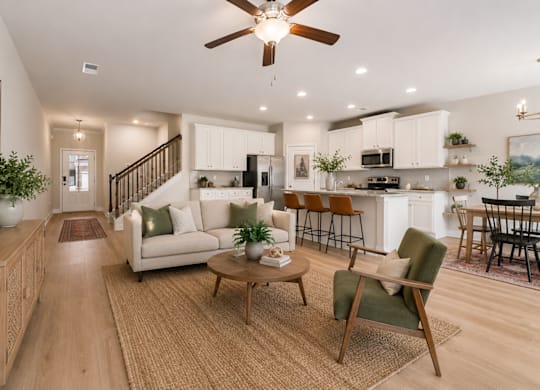 Spacious living room filled with abundant natural light.