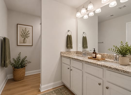 Elegant en suite with a double vanity off the primary bedroom.