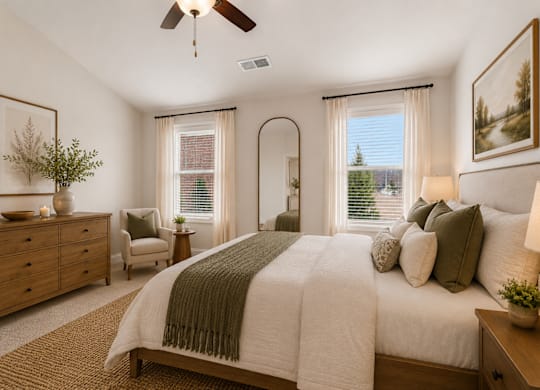 Designed with comfort in mind, this spacious primary suite offers the perfect blend of style.