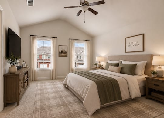 Spacious primary suite featuring a luxurious king bed, elegant finishes, and tranquil accents—designed for comfort, relaxation, and everyday retreat.