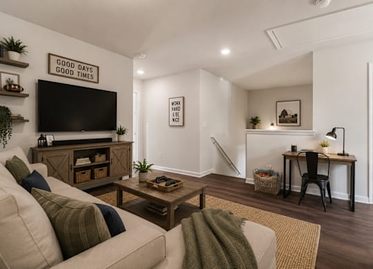 Versatile loft space perfect for a home office, media room, or additional living area.