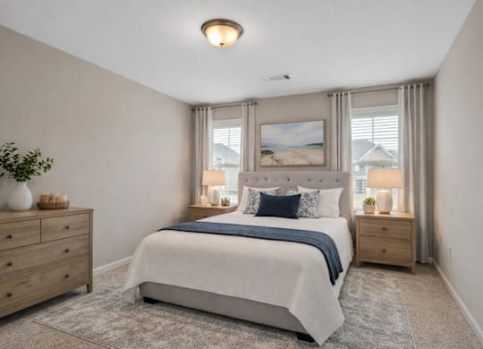 Guest bedroom featuring a queen bed