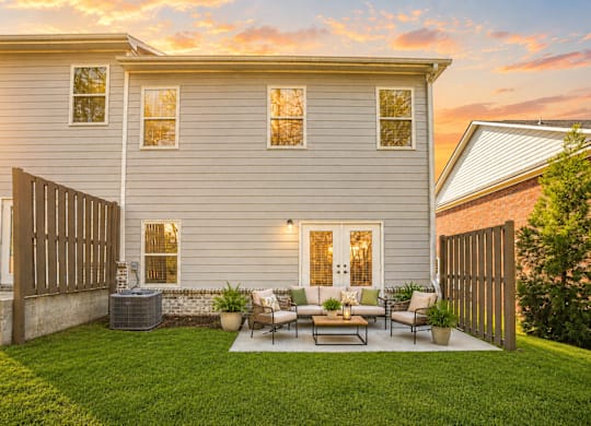 Private outdoor patio with comfortable seating—perfect for relaxing, dining, or enjoying the fresh air.