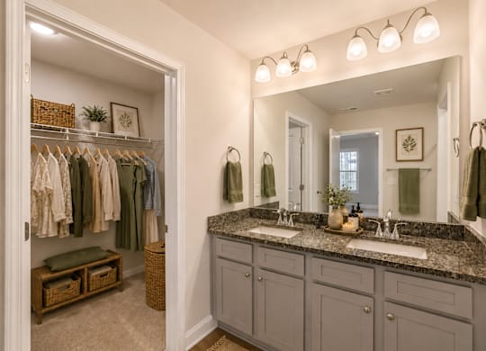 Secondary suite bathroom with a walk in closet.