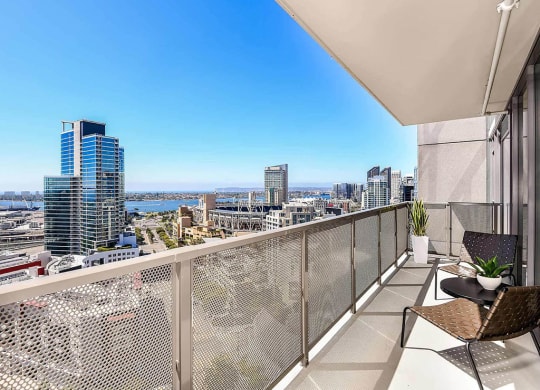 Large balcony with city views at K1 Apartments, San Diego, CA