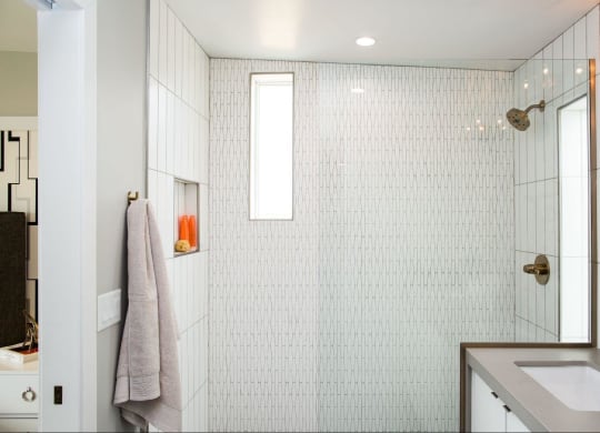 a white bathroom with a shower and a sink at Novella Arcadia, Arizona