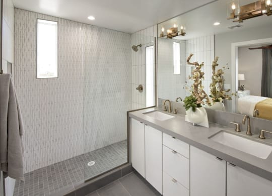 a bathroom with a sink and a mirror at Novella Arcadia, Phoenix, AZ