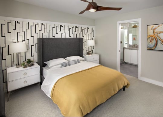 a bedroom with a bed and a ceiling fan at Novella Arcadia, Phoenix, 85018