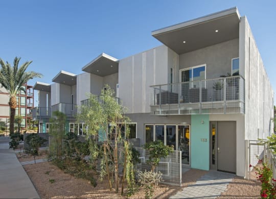 a building with a balcony and a blue sky at Novella Arcadia, Phoenix, AZ 85018