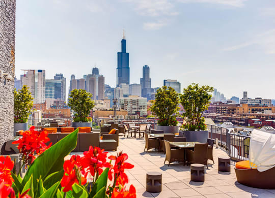 Rooftop lounge area with Chicago skyline views  at The Madison at Racine, Chicago, IL