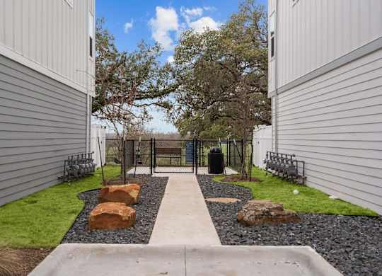 Beautiful Courtyard With Walking Paths at Villae ATX Luxury Rental Townhomes, Manchaca, TX, Texas