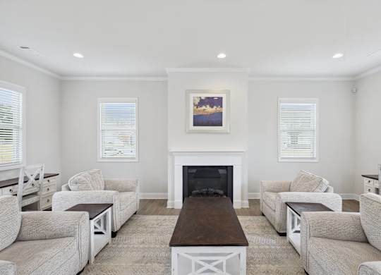 Elegant clubhouse lounge featuring a fireplace.