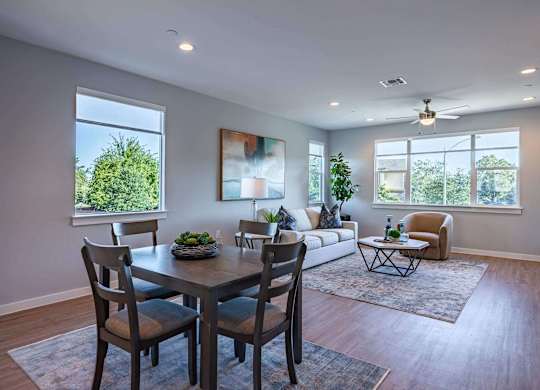 Living Room With Expansive Window and dining area at Villae ATX Luxury Rental Townhomes, Manchaca, 78652