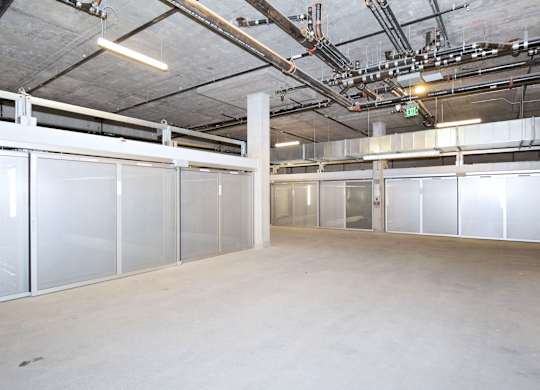 a large storage room with white doors