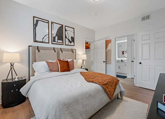 Spacious bedroom with furniture