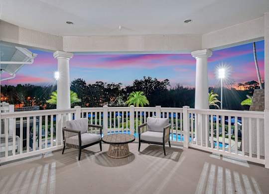 Private patio overlooking the resort style swimming pool