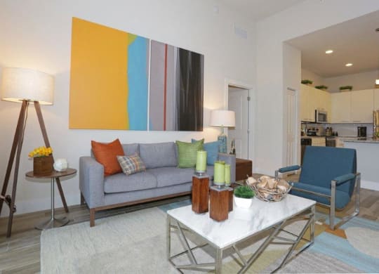 a living room with a couch and a table