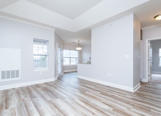 Drum hill one bedroom apartment family room and dining space