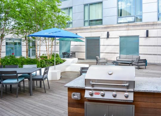 50 West broadway and 26 west broadway apartments, residences on broadway courtyard, lounge seating and grills
