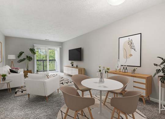 A living room with a white table and chairs.