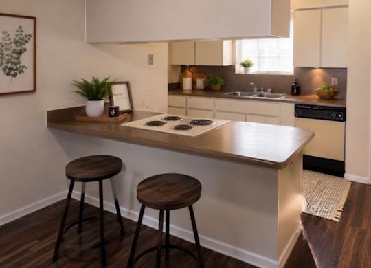 A kitchen with a white countertop and brown stools.