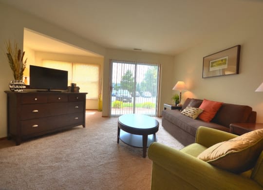 a living room with a couch and a table