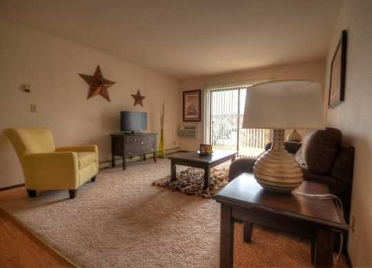 a living room with a couch and a table