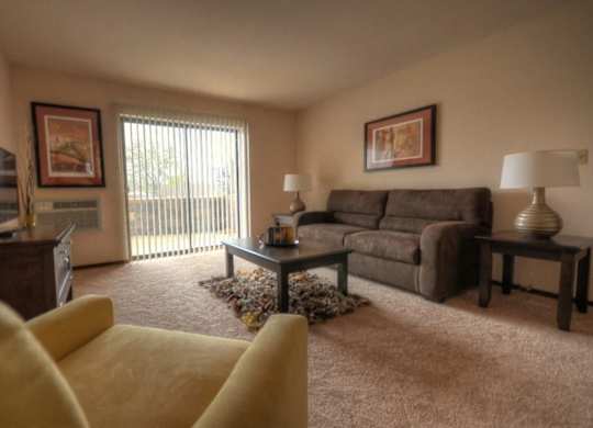 a living room with a couch and a tv