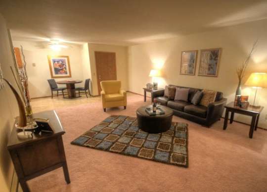 a living room with a couch and a table