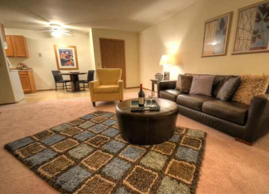 a living room with a couch and a table