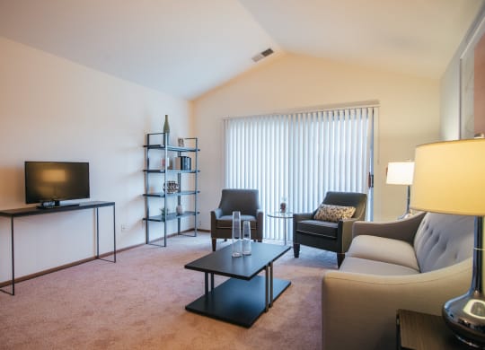 Living Room Space with sliding door leading out to patio or deck