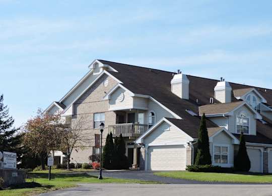 a apartment building with a street in front of it