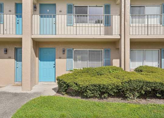 A building with blue doors and windows.