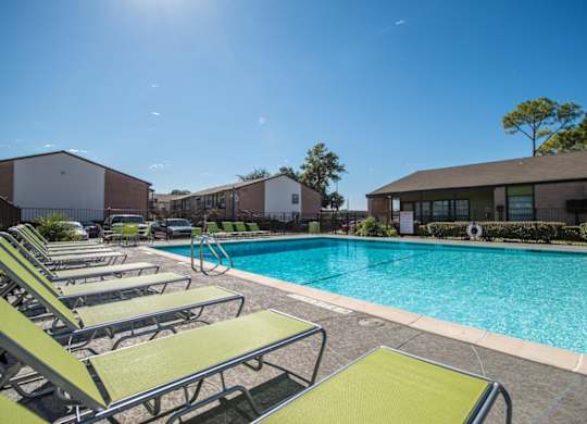 our apartments have a large swimming pool with lounge chairs