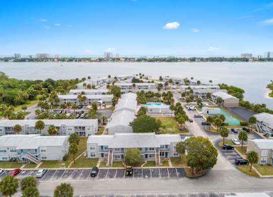 A bird's eye view of a 12th and beach apartments in Daytona Beach by the Halifax River