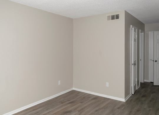 a bedroom with a large closet at 12th and beach apartments in daytona beach
