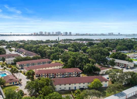 an aerial view of Ridge Apartments and the stunning Halifax River