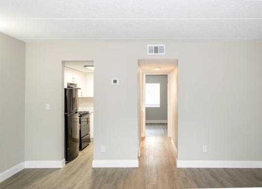A Ridge Apartment living room with an entrance to the kitchen and hallway