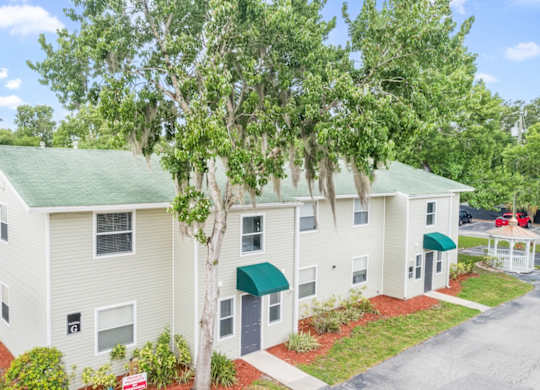 the well-kept exterior of a residential building at Haven on Canal surrounded by trees