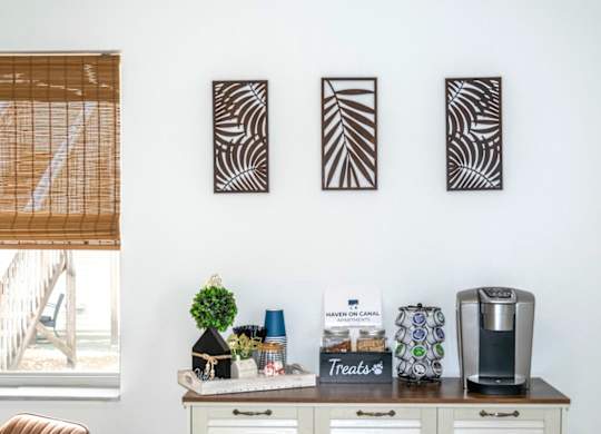 The coffee station in the office at Haven on Canal Apartments for rent in New Smyrna Beach