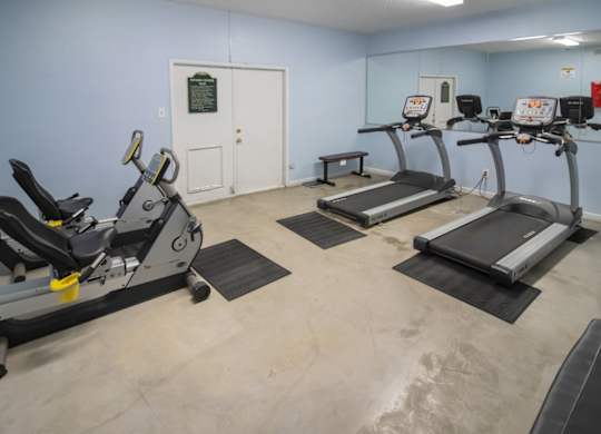 Pine Creek's fitness center with cardio equipment